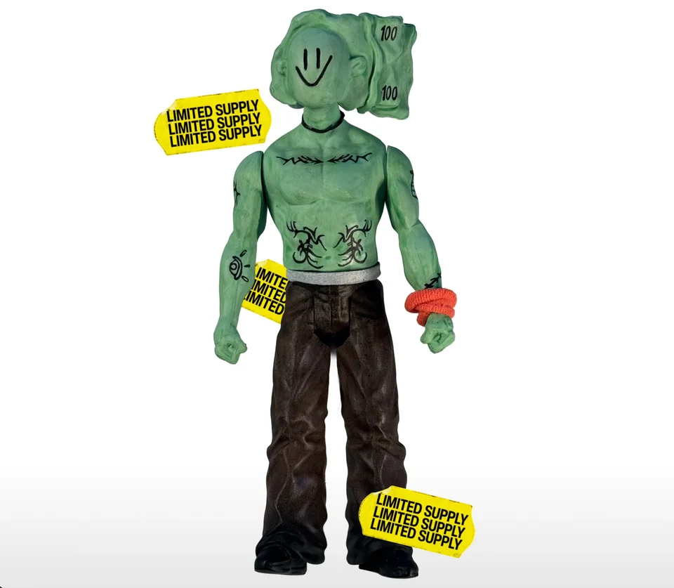 Uglyman action figure with limited-supply stickers