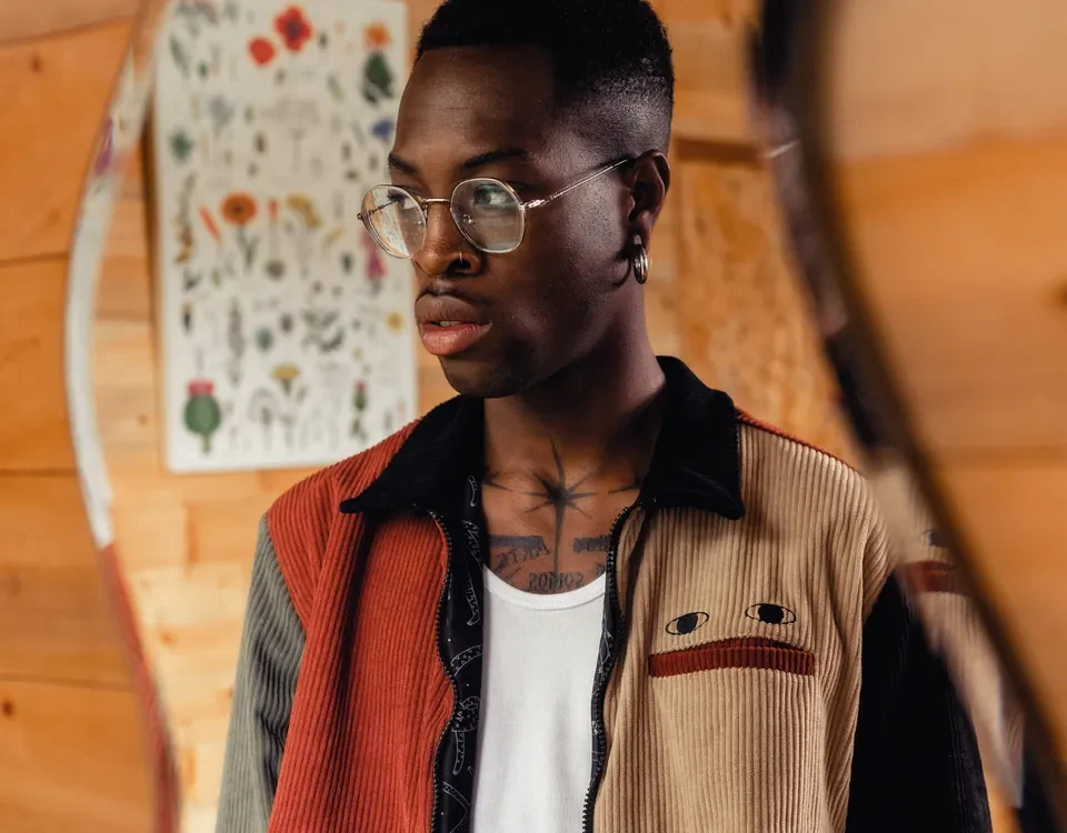 Model wearing a brown corduroy jacket from the collection