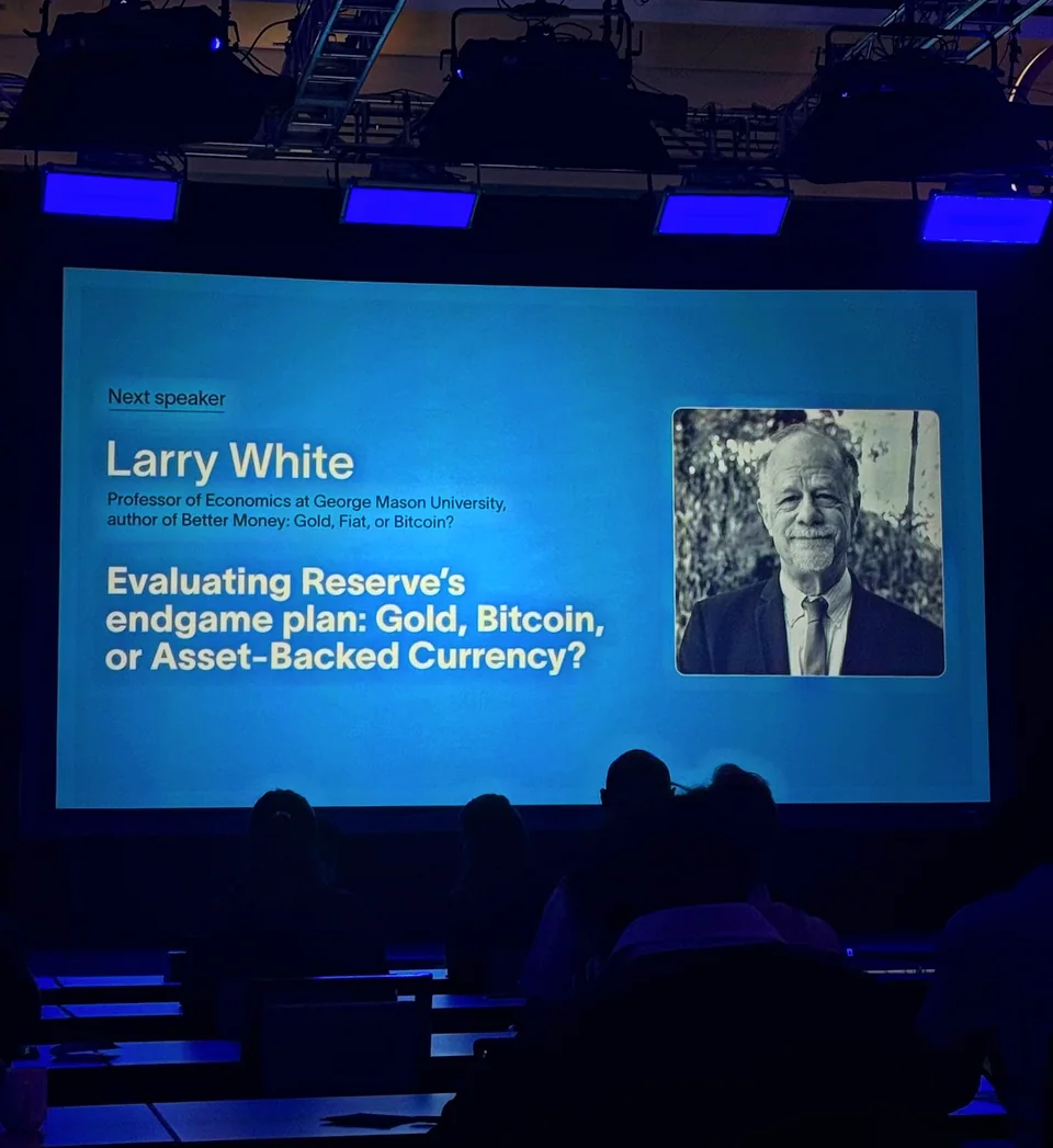 Monetarium 2 stage screen announcing the next speaker, Larry White